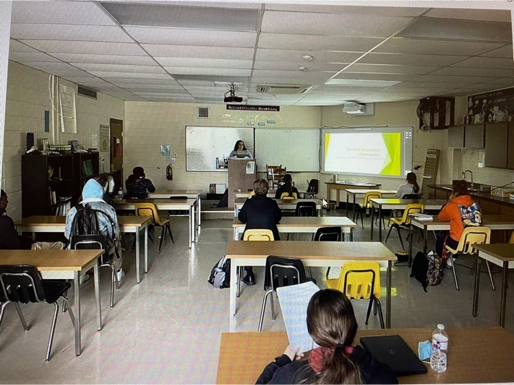 United Way investing in the future of our young adults through teaching real life skills about Tax Preparation and Auto Insurance to a class at Watson Chapel school .